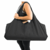 Canvas yoga mat bag with side pocket, available in multiple colors, featuring breathable material and a spacious design perfect for fitness and travel.