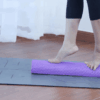 Colorful EVA foam roller with floating massage surface, perfect for yoga, Pilates, and muscle recovery exercises. 