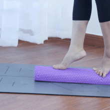 Colorful EVA foam roller with floating massage surface, perfect for yoga, Pilates, and muscle recovery exercises. 