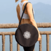 Black nylon yoga wheel bag with mandala design, large capacity, and double zipper closure for easy storage and transport.