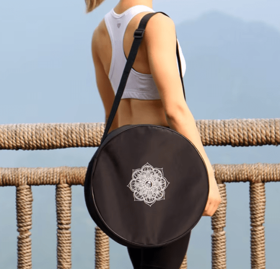 Black nylon yoga wheel bag with mandala design, large capacity, and double zipper closure for easy storage and transport.